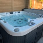 Created new area for hot tub and seating with all ground works and laying new porcelain tiles